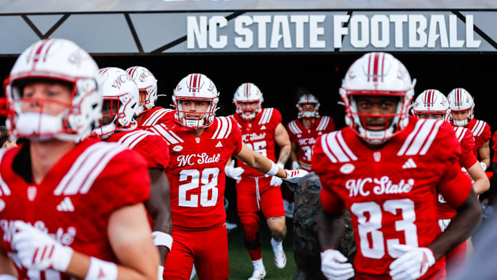 Aug 28, 2025; Raleigh, North Carolina, USA; North Carolina State Wolfpack wide receiver Sam Dodd (28) runs out during the warmups prior to the game against East Carolina Pirates at Carter-Finley Stadium. Mandatory Credit: Jaylynn Nash-Imagn Images Aug 28, 2025; Raleigh, North Carolina, USA; North Carolina State Wolfpack wide receiver Sam Dodd (28) runs out during the warmups prior to the game against East Carolina Pirates at Carter-Finley Stadium. Mandatory Credit: Jaylynn Nash-Imagn Images