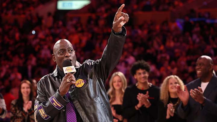 Jan 13, 2025; Los Angeles, California, USA: Former Los Angeles Laker Michael Cooper speaks during his jersey retirement at halftime between the Lakers and the San Antonio Spurs at Crypto.com Arena. Mandatory Credit: Kiyoshi Mio-Imagn Images