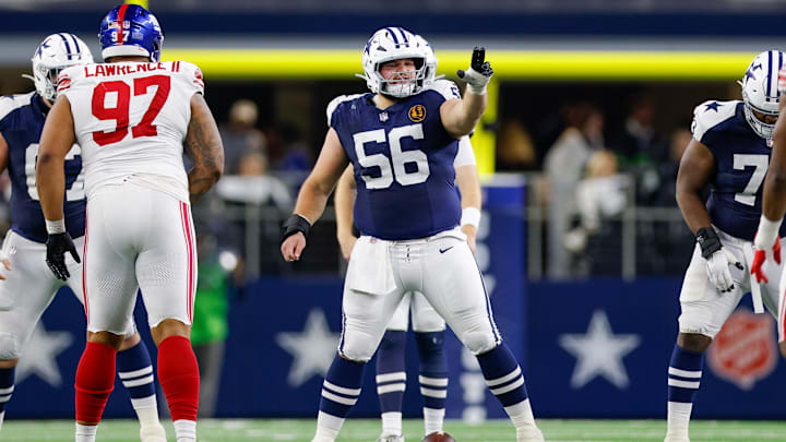 Dallas Cowboys center Cooper Beebe signals at the line against the New York Giants during the second quarter at AT&T Stadium. 