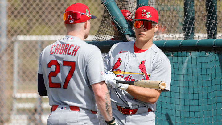 Feb 16, 2026; Jupiter, FL, USA;  St. Louis Cardinals infielder JJ Wetherholt (77) talks with left fielder Nathan Church (27) after batting practice during spring training workouts at Roger Dean Stadium. Mandatory Credit: Reinhold Matay-Imagn Images