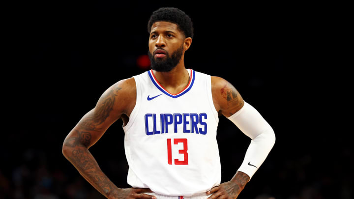 Apr 9, 2024; Phoenix, Arizona, USA;  LA Clippers forward Paul George (13) looks on during the first quarter of the game against the Phoenix Suns at Footprint Center. Mandatory Credit: Mark J. Rebilas-USA TODAY Sports