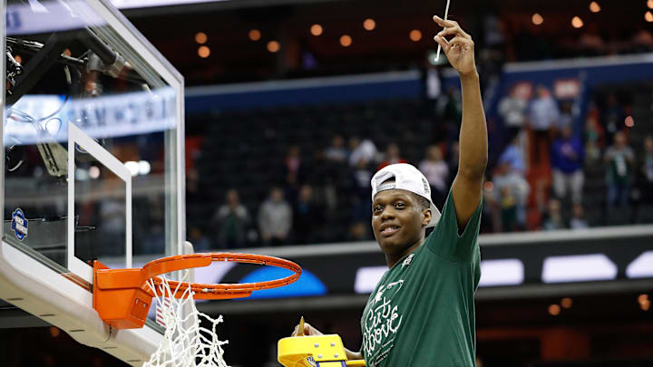 Mar 31, 2019; Washington, DC, USA; Michigan State Spartans guard Cassius Winston (5) cuts down the net after the Spartans' game against the Duke Blue Devils in the championship game of the east regional of the 2019 NCAA Tournament at Capital One Arena. Mandatory Credit: Geoff Burke-Imagn Images Mar 31, 2019; Washington, DC, USA; Michigan State Spartans guard Cassius Winston (5) cuts down the net after the Spartans' game against the Duke Blue Devils in the championship game of the east regional of the 2019 NCAA Tournament at Capital One Arena. Mandatory Credit: Geoff Burke-Imagn Images