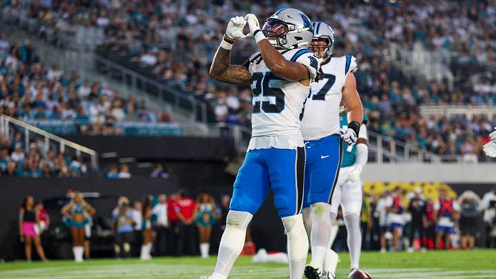 Carolina Panthers running back Jonathon Brooks (25) reacts after scoring a touchdown against the Jacksonville Jaguars in the first quarter during a preseason game at EverBank Stadium. Mandatory Credit: Nathan Ray Seebeck-Imagn Images
