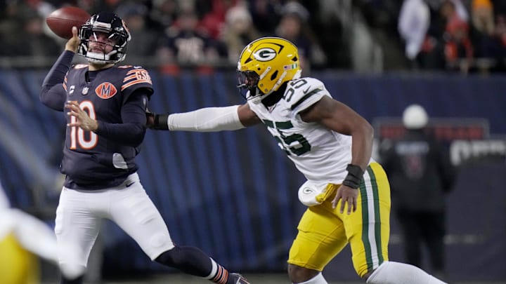 Caleb Williams is pressured by Packers defensive end Kingsley Enagbare in Saturday's 22-16 Bears win.