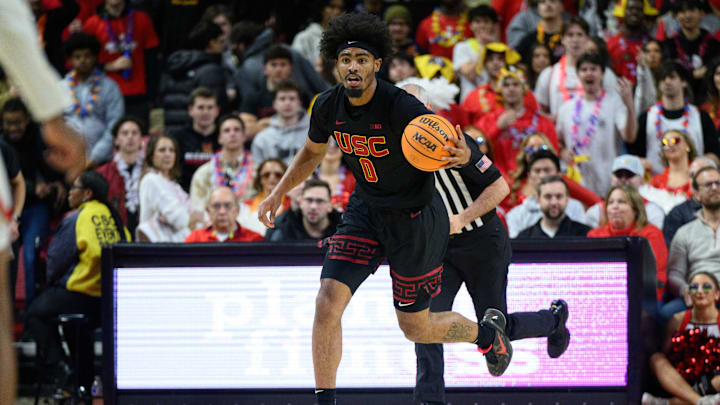Feb 20, 2025; College Park, Maryland, USA; USC Trojans forward Saint Thomas (0) handles the ball during the first half against the Maryland Terrapins at Xfinity Center. Mandatory Credit: Reggie Hildred-Imagn Images