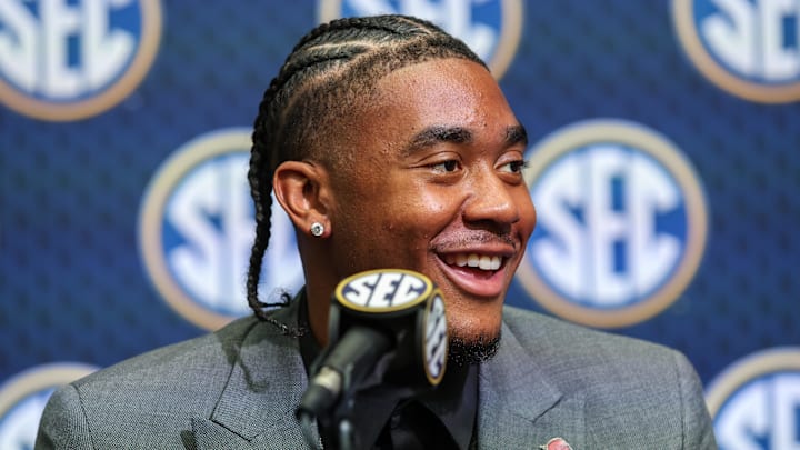 Arkansas Razorbacks quarterback Taylen Green enjoys a laugh while answering questions during SEC Media Days on Thursday at Omni Atlanta Hotel.