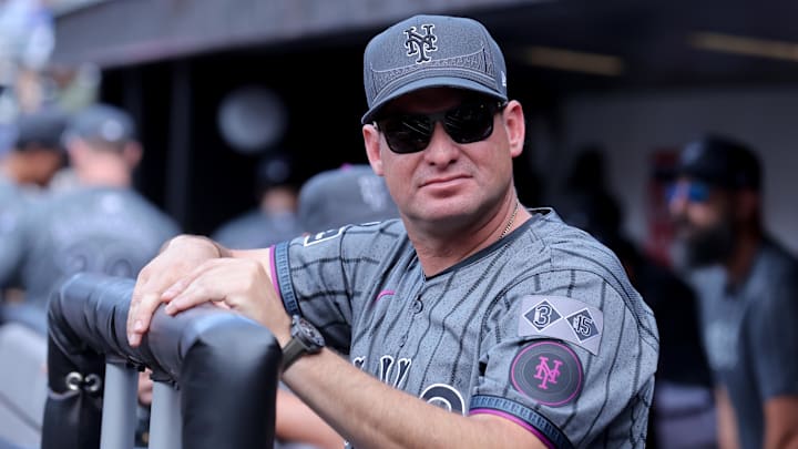 Jul 27, 2024; New York City, New York, USA; New York Mets manager Carlos Mendoza (64) in the dugout before a game against the Atlanta Braves at Citi Field. Mandatory Credit: Brad Penner-Imagn Images