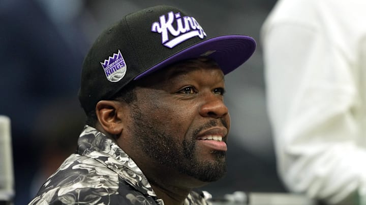 Apr 11, 2025; Sacramento, California, USA; Musical artist 50 Cent sits courtside before the game between the Sacramento Kings and the Los Angeles Clippers at Golden 1 Center. Mandatory Credit: Darren Yamashita-Imagn Images