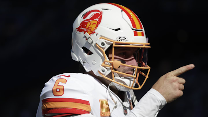 Oct 5, 2025; Seattle, Washington, USA; Tampa Bay quarterback Baker Mayfield (6) wearing the Buccaneers throwback helmets as he warms ups prior to a game against the Seattle Seahawks at Lumen Field. Mandatory Credit: Joe Nicholson-Imagn Images