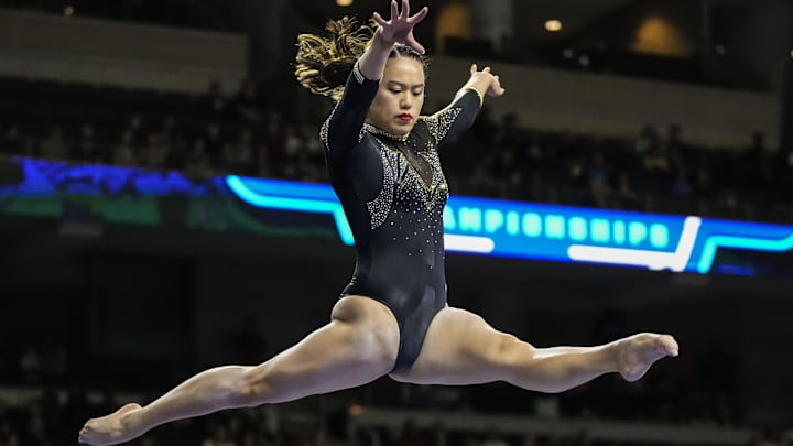Mar 18, 2023; Duluth, GA, USA; Missouri Tigers gymnast Helen Hu competes on the balance beam during the SEC Gymnastics Championship at Gas South Arena. Mandatory Credit: Dale Zanine-Imagn Images Mar 18, 2023; Duluth, GA, USA; Missouri Tigers gymnast Helen Hu competes on the balance beam during the SEC Gymnastics Championship at Gas South Arena. Mandatory Credit: Dale Zanine-Imagn Images