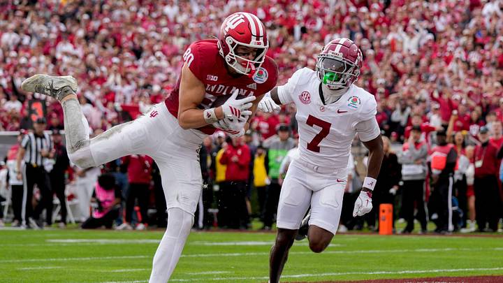 Indiana Hoosiers wide receiver Charlie Becker (80) makes a catch for a touchdown as Alabama Crimson Tide defensive back Dashawn Jones (7) chases after Thursday, Jan. 1, 2026, during the Rose Bowl and quarterfinal game of the College Football Playoff at Rose Bowl Stadium in Pasadena, Calif. Indiana Hoosiers wide receiver Charlie Becker (80) makes a catch for a touchdown as Alabama Crimson Tide defensive back Dashawn Jones (7) chases after Thursday, Jan. 1, 2026, during the Rose Bowl and quarterfinal game of the College Football Playoff at Rose Bowl Stadium in Pasadena, Calif.
