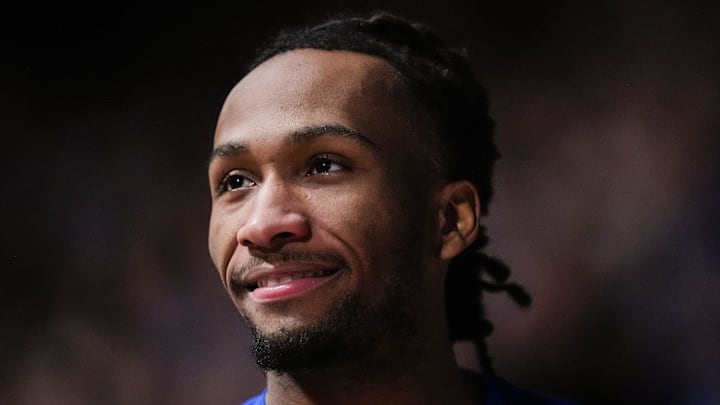 Dec 16, 2025; Lawrence, Kansas, USA; Kansas Jayhawks guard Darryn Peterson (22) reacts during introductions prior to a game against the Towson Tigers at Allen Fieldhouse. Mandatory Credit: Jay Biggerstaff-Imagn Images