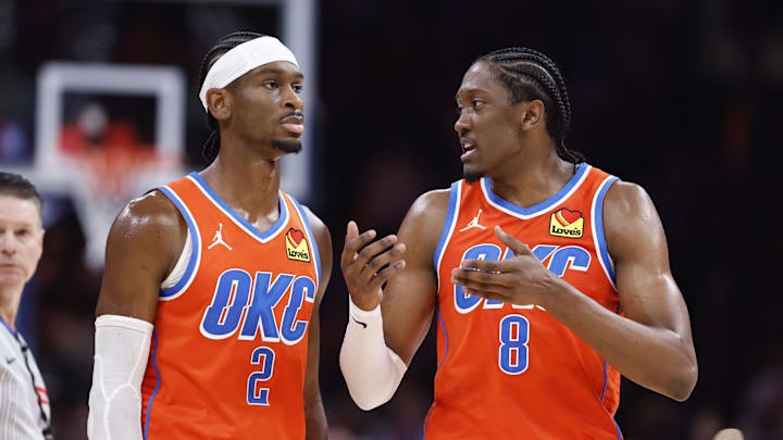 Nov 10, 2024; Oklahoma City, Oklahoma, USA; Oklahoma City Thunder guard Shai Gilgeous-Alexander (2) and forward Jalen Williams (8) talk during a time out against the Golden State Warriors during the second half at Paycom Center. Mandatory Credit: Alonzo Adams-Imagn Images Nov 10, 2024; Oklahoma City, Oklahoma, USA; Oklahoma City Thunder guard Shai Gilgeous-Alexander (2) and forward Jalen Williams (8) talk during a time out against the Golden State Warriors during the second half at Paycom Center. Mandatory Credit: Alonzo Adams-Imagn Images
