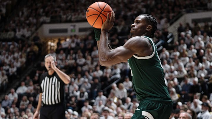 Feb 26, 2026; West Lafayette, Indiana, USA; Michigan State Spartans forward Coen Carr (55) shoots a three pointer during the first half of a game against the Purdue Boilersmakers at Mackey Arena. Mandatory Credit: Jacob Musselman-Imagn Images