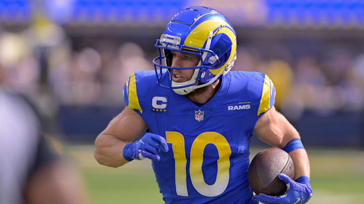 Oct 15, 2023; Inglewood, California, USA; Los Angeles Rams wide receiver Cooper Kupp (10) runs after a catch against the Arizona Cardinals during the first half at SoFi Stadium. Mandatory Credit: Alex Gallardo-Imagn Images