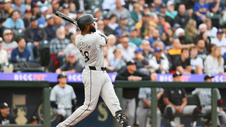 Jun 10, 2024; Seattle, Washington, USA; Chicago White Sox center fielder Luis Robert Jr. (88) hits a 2-run home run against the Seattle Mariners during the sixth inning at T-Mobile Park.