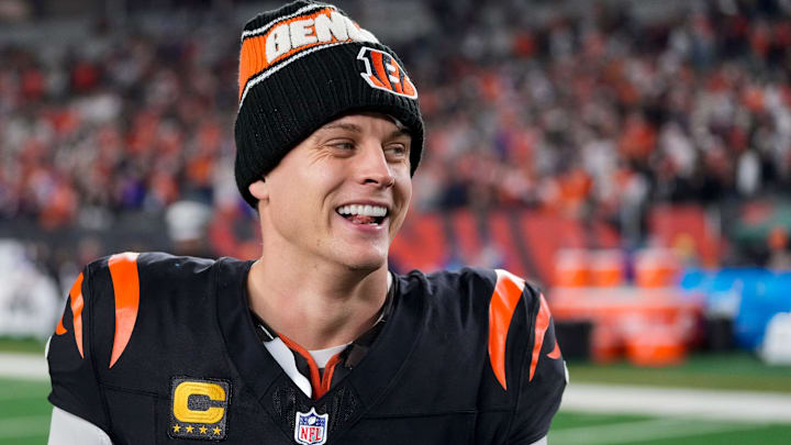 Cincinnati Bengals quarterback Joe Burrow (9) celebrates the overtime win of the NFL Week 17 game between the Cincinnati Bengals and the Denver Broncos at Paycor Stadium in downtown Cincinnati on Saturday, Dec. 28, 2024. The Bengals took a 30-24 win in overtime to remain in the post season chase. Cincinnati Bengals quarterback Joe Burrow (9) celebrates the overtime win of the NFL Week 17 game between the Cincinnati Bengals and the Denver Broncos at Paycor Stadium in downtown Cincinnati on Saturday, Dec. 28, 2024. The Bengals took a 30-24 win in overtime to remain in the post season chase.