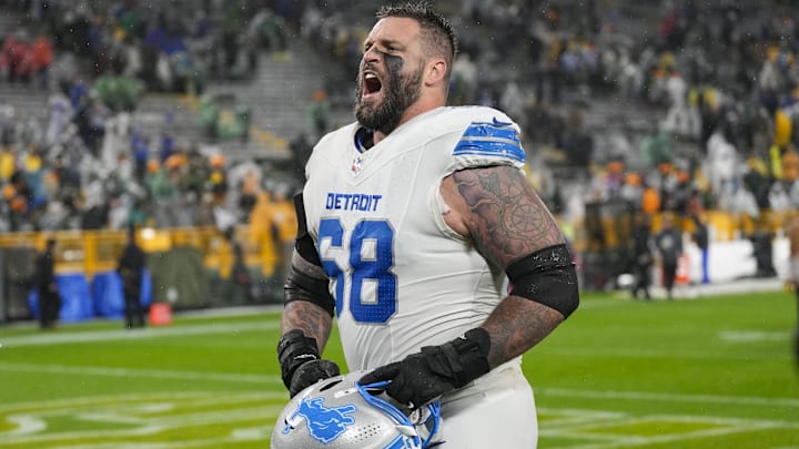 Nov 3, 2024; Green Bay, Wisconsin, USA;  Detroit Lions offensive tackle Taylor Decker (68) celebrates as he runs off the field following the game against the Green Bay Packers at Lambeau Field. Mandatory Credit: Jeff Hanisch-Imagn Images