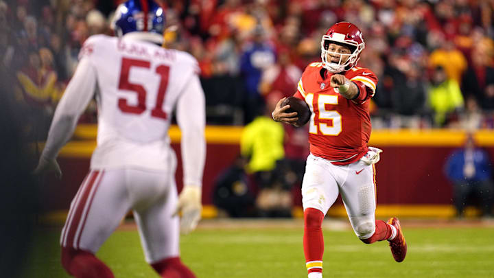 Nov 1, 2021; Kansas City, Missouri, USA; Kansas City Chiefs quarterback Patrick Mahomes (15) gestures as he runs with the ball as New York Giants outside linebacker Azeez Ojulari (51) defends during the second half at GEHA Field at Arrowhead Stadium. Mandatory Credit: Jay Biggerstaff-Imagn Images Nov 1, 2021; Kansas City, Missouri, USA; Kansas City Chiefs quarterback Patrick Mahomes (15) gestures as he runs with the ball as New York Giants outside linebacker Azeez Ojulari (51) defends during the second half at GEHA Field at Arrowhead Stadium. Mandatory Credit: Jay Biggerstaff-Imagn Images