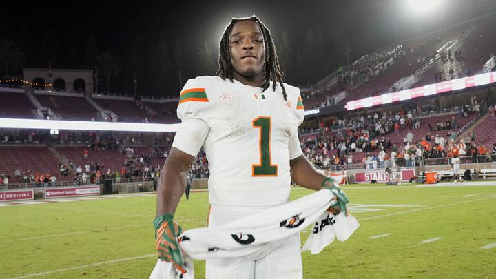 Sep 4, 2026; Stanford, California, USA;  Miami Hurricanes quarterback Darian Mensah (10) stands on the field after defeating the Stanford Cardinal at Stanford Stadium.  Mandatory Credit: Stan Szeto-Imagn Images