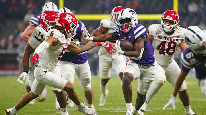 Kansas State runningback Joe Jackson (4) runs downfield against Rutgers during second half of the Rate Bowl at Chase Field on Dec. 26, 2024, in Phoenix.