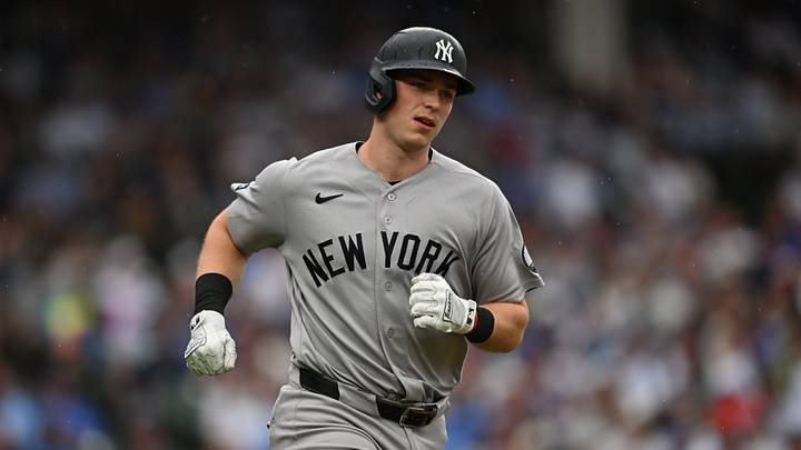 Jul 31, 2026; Chicago, Illinois, USA; New York Yankees designated hitter Ben Rice (22) runs after hitting a single against the Chicago Cubs during the sixth inning at Wrigley Field. Mandatory Credit: Patrick Gorski-Imagn Images