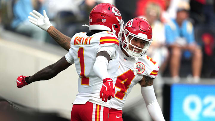 Sep 29, 2024; Inglewood, California, USA; Kansas City Chiefs wide receiver Xavier Worthy (1) celebrates with wide receiver Skyy Moore (24) after catching a 54-yard touchdown pass in the second quarter against the Los Angeles Chargers at SoFi Stadium. Mandatory Credit: Kirby Lee-Imagn Images