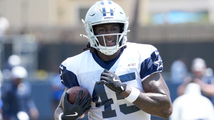 Dallas Cowboys tight end Rivaldo Fairweather carries the ball at training camp at the River Ridge Fields in Oxnard