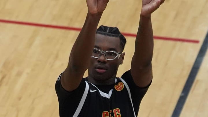 Bryce James (5), son of basketball star LeBron James, shoots a free throw during the Strive for Greatness (SFG) and Arizona Unity game at the Nike Peach Jam at Riverview Park Activities Center. SFG won 68-66.