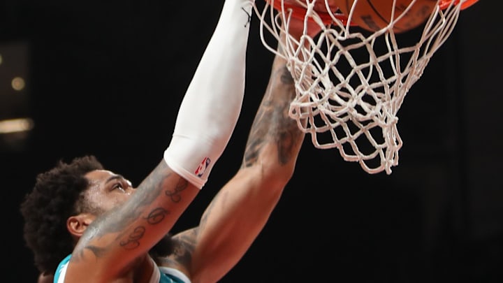 Mar 12, 2025; Atlanta, Georgia, USA; Charlotte Hornets forward Miles Bridges (0) dunks against the Atlanta Hawks during the second half at State Farm Arena. Mandatory Credit: Mady Mertens-Imagn Images
