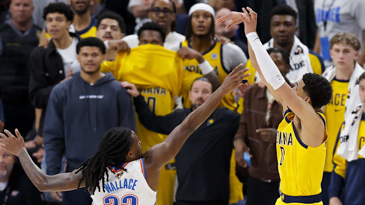 Jun 5, 2025; Oklahoma City, Oklahoma, USA; Indiana Pacers guard Tyrese Haliburton (0) makes the game winning shot over Oklahoma City Thunder guard Cason Wallace (22) during the fourth quarter during game one of the 2025 NBA Finals at Paycom Center. Mandatory Credit: Alonzo Adams-Imagn Images Jun 5, 2025; Oklahoma City, Oklahoma, USA; Indiana Pacers guard Tyrese Haliburton (0) makes the game winning shot over Oklahoma City Thunder guard Cason Wallace (22) during the fourth quarter during game one of the 2025 NBA Finals at Paycom Center. Mandatory Credit: Alonzo Adams-Imagn Images