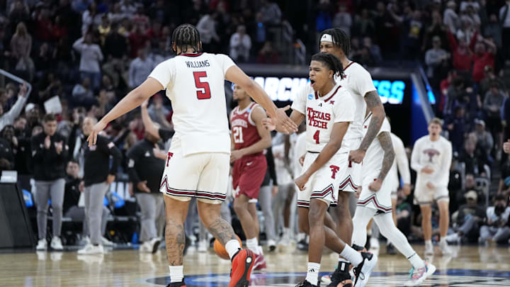 Texas Tech Red Raiders forward Williams celebrates with guard Anderson after shooting a game-tying three point basket.