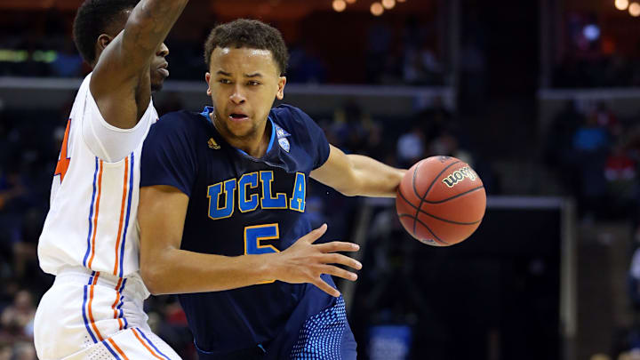 Mar 27, 2014; Memphis, TN, USA; UCLA Bruins guard/forward Kyle Anderson (5) drives against Florida Gators forward Casey Prather (24) during the second half in the semifinals of the south regional of the 2014 NCAA Mens Basketball Championship tournament at FedExForum. Mandatory Credit: Spruce Derden-Imagn Images Mar 27, 2014; Memphis, TN, USA; UCLA Bruins guard/forward Kyle Anderson (5) drives against Florida Gators forward Casey Prather (24) during the second half in the semifinals of the south regional of the 2014 NCAA Mens Basketball Championship tournament at FedExForum. Mandatory Credit: Spruce Derden-Imagn Images