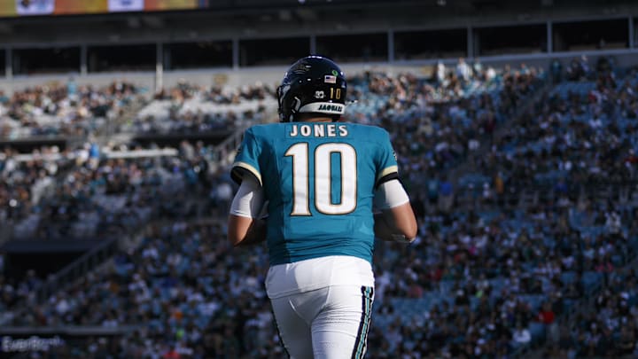 Dec 15, 2024; Jacksonville, Florida, USA; Jacksonville Jaguars quarterback Mac Jones (10) practices before the snap against the New York Jets during the fourth quarter at EverBank Stadium. Mandatory Credit: Morgan Tencza-Imagn Images