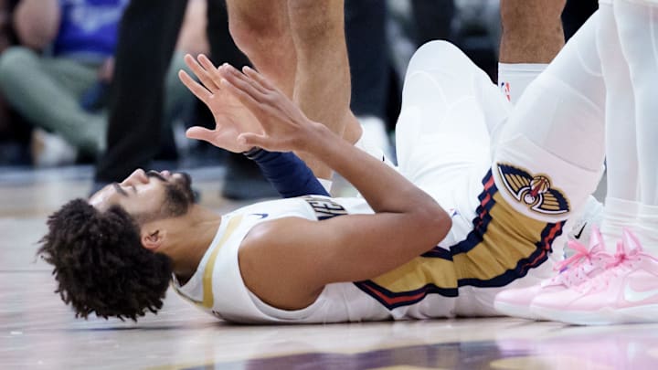 Dec 26, 2025; New Orleans, Louisiana, USA; New Orleans Pelicans guard Jordan Poole (3) reacts after making a three point basket and getting a foul shot after being fouled by the Phoenix Suns during the first half at Smoothie King Center. Mandatory Credit: Matthew Hinton-Imagn Images