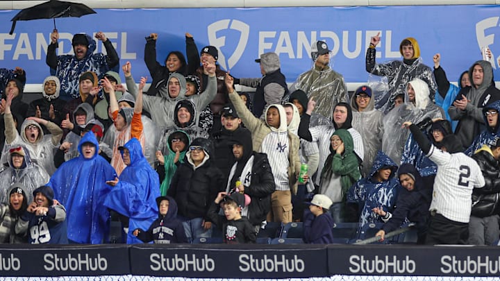 Apr 11, 2025; Bronx, New York, USA; Fans react after an RBI double by New York Yankees catcher Austin Wells (28) during the third inning against the San Francisco Giants at Yankee Stadium