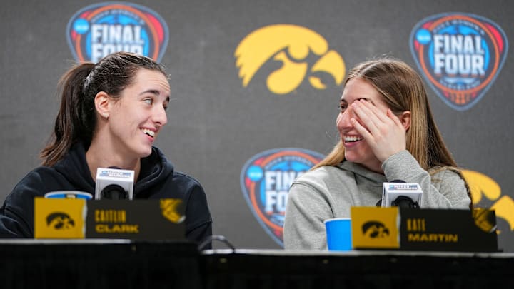 Iowa Hawkeyes guard Caitlin Clark (22) and Iowa Hawkeyes guard Kate Martin (20) take questions at Rocket Mortgage Arena, Thursday, April 4, 2024 in Cleveland. Iowa Hawkeyes guard Caitlin Clark (22) and Iowa Hawkeyes guard Kate Martin (20) take questions at Rocket Mortgage Arena, Thursday, April 4, 2024 in Cleveland.