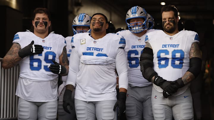 The Detroit Lions wait for player introductions.