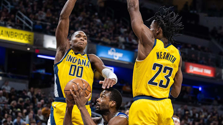 Feb 2, 2024; Indianapolis, Indiana, USA; Sacramento Kings forward Harrison Barnes (40) shoots the ball while Indiana Pacers guard Bennedict Mathurin (00) and forward Aaron Nesmith (23) defend in the second half at Gainbridge Fieldhouse. Mandatory Credit: Trevor Ruszkowski-Imagn Images Feb 2, 2024; Indianapolis, Indiana, USA; Sacramento Kings forward Harrison Barnes (40) shoots the ball while Indiana Pacers guard Bennedict Mathurin (00) and forward Aaron Nesmith (23) defend in the second half at Gainbridge Fieldhouse. Mandatory Credit: Trevor Ruszkowski-Imagn Images