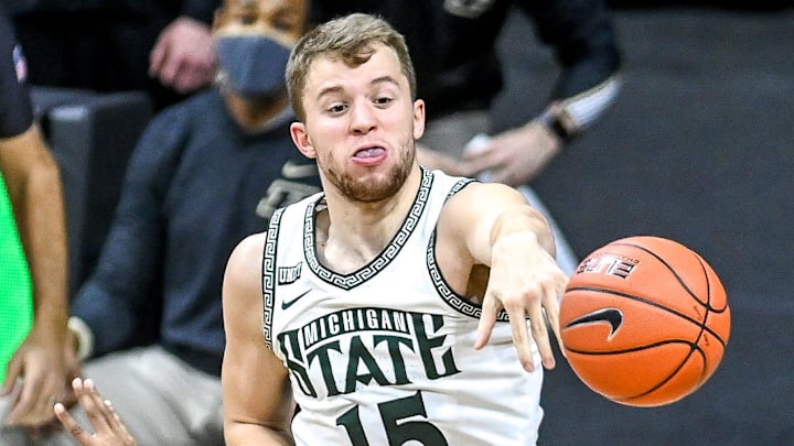 Michigan State's Thomas Kithier blocks a shot by Purdue's Isaiah Thompson during the second half on Friday, Jan. 8, 2021, at the Breslin Center in East Lansing.

210108 Msu Purdue 132a