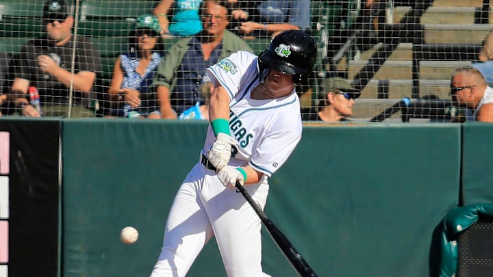 Outfielder (13) Ethan O'Donnell makes a home run hit and scores the first point of the game. Outfielder (13) Ethan O'Donnell makes a home run hit and scores the first point of the game.