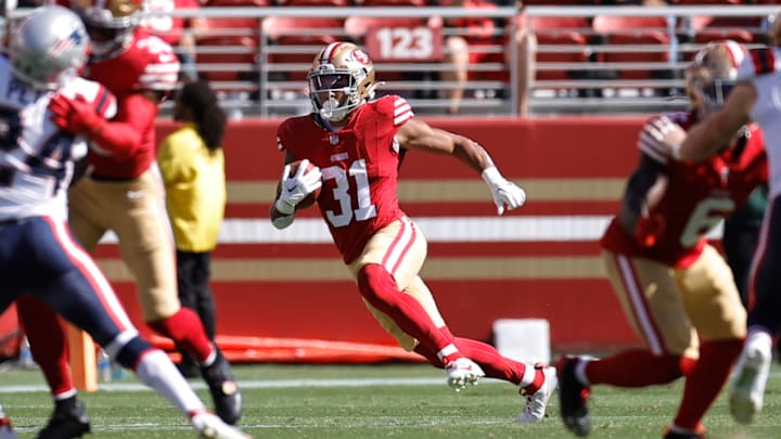 San Francisco 49ers running back Isaac Guerendo (31)
