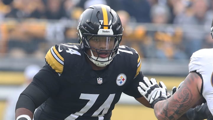 Nov 17, 2024; Pittsburgh, Pennsylvania, USA;  Pittsburgh Steelers guard Spencer Anderson (74) blocks at the line of scrimmage against Baltimore Ravens defensive end Brent Urban (97) during the second quarter at Acrisure Stadium. Mandatory Credit: Charles LeClaire-Imagn Images