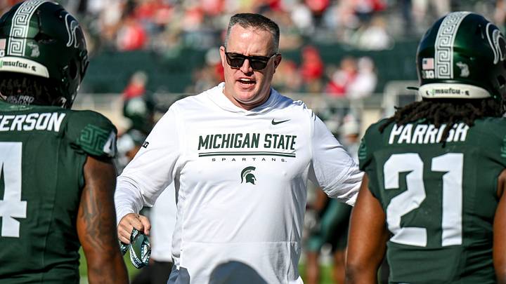 Michigan State’s head coach Pat Fitzgerald, center, talks with Jaziun Patterson, left, and Marvis Parrish before the football game against Nebraska on Saturday, Sept. 26, 2026, in East Lansing. Michigan State’s head coach Pat Fitzgerald, center, talks with Jaziun Patterson, left, and Marvis Parrish before the football game against Nebraska on Saturday, Sept. 26, 2026, in East Lansing.