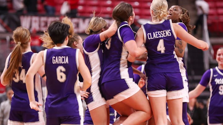 Kansas State Women’s Basketball players celebrate their win
