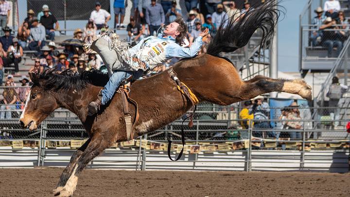 Bareback rider Keenan Hayes competes in Tucson at the La Fiesta de los Vaqueros Rodeo. Bareback rider Keenan Hayes competes in Tucson at the La Fiesta de los Vaqueros Rodeo.