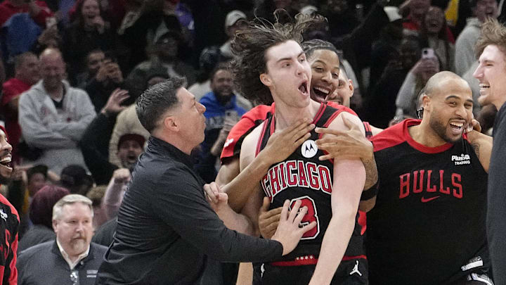 Mar 27, 2025; Chicago, Illinois, USA; Chicago Bulls guard Josh Giddey (3) celebrates with teammates after making the game-winning three point basket against the Los Angeles Lakers during the second half at United Center. Mandatory Credit: David Banks-Imagn Images