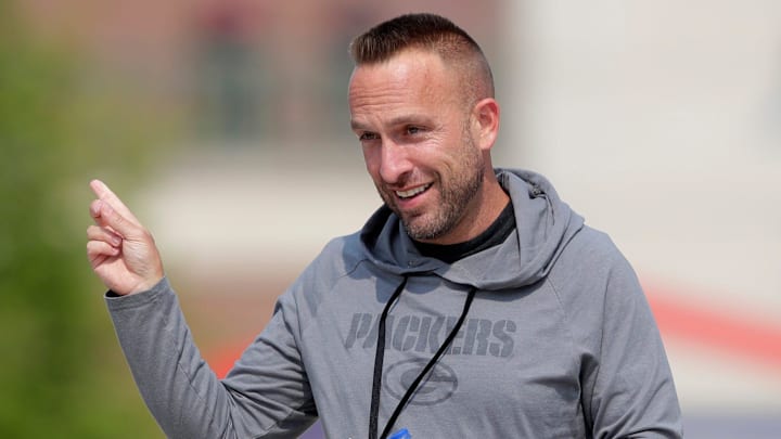 Green Bay Packers defensive coordinator Jeff Hafley interacts with fans before the start of practice on July 25, 2025, in Green Bay, Wis.