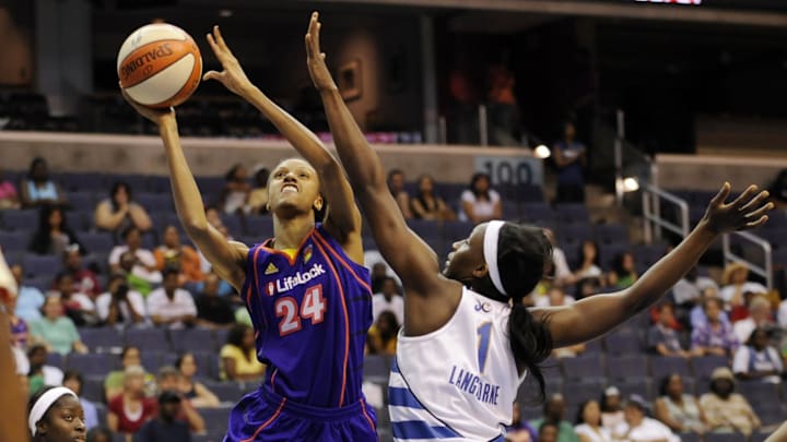 June 27, 2010; Washington, DC, USA; Phoenix Mercury forward DeWanna Bonner (left) attempts a layup in front of Washington Mystics forward Crystal Langhorne during the first half at the Verizon Center. Mandatory Credit: Rafael Suanes-Imagn Images June 27, 2010; Washington, DC, USA; Phoenix Mercury forward DeWanna Bonner (left) attempts a layup in front of Washington Mystics forward Crystal Langhorne during the first half at the Verizon Center. Mandatory Credit: Rafael Suanes-Imagn Images