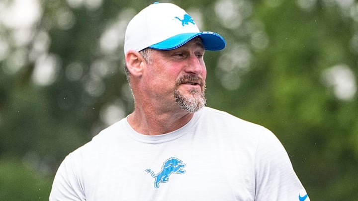Detroit Lions head coach Dan Campbell, left, talks to team president and CEO Rod Wood and general manager Brad Holmes after practice during training camp at Meijer Performance Center in Allen Park on Sunday, July 20, 2025.